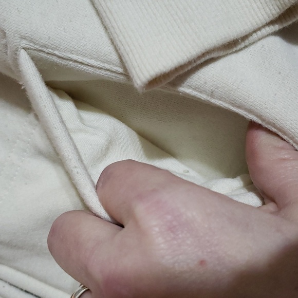 Attraction zip up jacket says Canada in front. Cream in color size lg - Picture 3 of 9